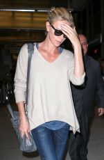 CHARLIZE THERON Arrives at Los Angeles International Airport 07/31/2015