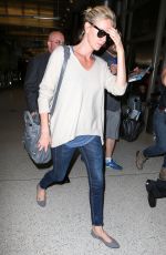 CHARLIZE THERON Arrives at Los Angeles International Airport 07/31/2015