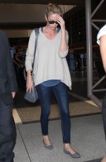 CHARLIZE THERON Arrives at Los Angeles International Airport 07/31/2015
