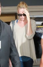 CHARLIZE THERON Arrives at Los Angeles International Airport 07/31/2015