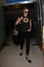 CHARLIZE THERON Arrives at Los Angeles International Airport 08/28/2015