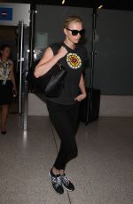 CHARLIZE THERON Arrives at Los Angeles International Airport 08/28/2015