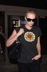 CHARLIZE THERON Arrives at Los Angeles International Airport 08/28/2015