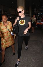 CHARLIZE THERON Arrives at Los Angeles International Airport 08/28/2015