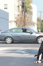 CHARLIZE THERON Out and About in Los Angeles 08/22/2015