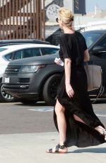 CHARLIZE THERON Out and About in Los Angeles 08/22/2015