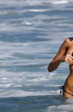 CHARLOTTE MCKINNEY in Bikini at a Beach in Malibu 08/09/2015