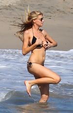 CHARLOTTE MCKINNEY in Bikini at a Beach in Malibu 08/09/2015