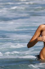 CHARLOTTE MCKINNEY in Bikini at a Beach in Malibu 08/09/2015