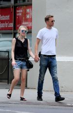 DAKOTA FANNING and Jamie Strachan Out in New York 08/30/2015