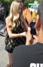 DENISE RICHARDS on the Set of Extra in Los Angeles 08/11/2015