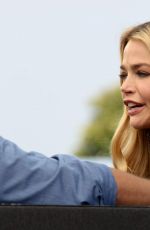 DENISE RICHARDS on the Set of Extra in Los Angeles 08/11/2015