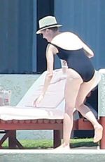 DIANE KRUGER in Swimsuit at a Pool in Cabo San Lucas 08/22/2015