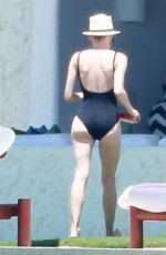 DIANE KRUGER in Swimsuit at a Pool in Cabo San Lucas 08/22/2015
