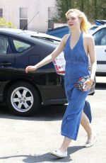 ELLE FANNING Out and About in Beverly Hills 08/22/2015