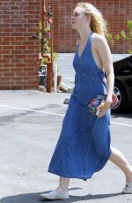ELLE FANNING Out and About in Beverly Hills 08/22/2015