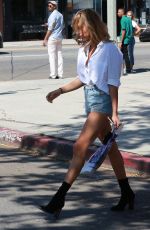 HAILEY BALDWIN in Denim Shorts Shopping in West Hollywood 08/08/2015