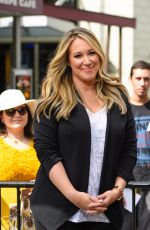 HILARY and HAYLIE DUFF in the Set of Extra