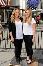 HILARY and HAYLIE DUFF in the Set of Extra