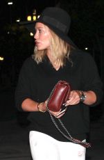 HILARY DUFF Arrives at Taylor Swift