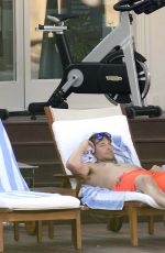 IRINA SHAYK in Bikini at a Pool in Capri 08/13/2015