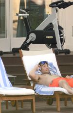 IRINA SHAYK in Bikini at a Pool in Capri 08/13/2015
