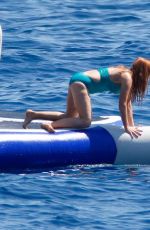ISLA FISHER in Swimsuit in St. Tropez 08/22/2015
