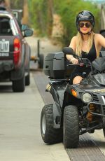 KENDALL JENNER and KHLOE KARDASHIAN Riding ATV