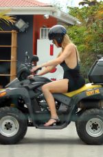 KENDALL JENNER and KHLOE KARDASHIAN Riding ATV