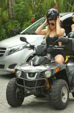 KENDALL JENNER and KHLOE KARDASHIAN Riding ATV