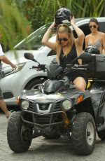 KENDALL JENNER and KHLOE KARDASHIAN Riding ATV