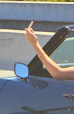 KENDALL JENNER Driving a Camaro Out in Beverly Hills 08/04/2015