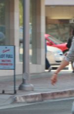 KENDALL JENNER in Tight Ripped Jeans Out in Beverly Hills 08/22/2015