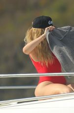 KHLOE KARDASHIAN and KENDALL JENNER inSwimsuits on a Boat in St. Barts 08/19/2015