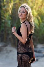KIMBERLEY GARNER in Swimsuit at a Beach in St. Tropez 08/06/2015