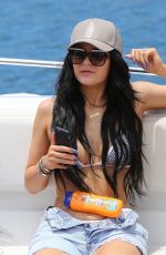 KYLIE JENNER in Bikini Top Arrives at a Boat