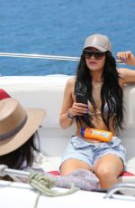 KYLIE JENNER in Bikini Top Arrives at a Boat