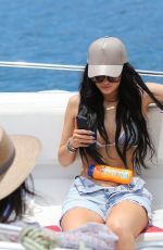 KYLIE JENNER in Bikini Top Arrives at a Boat