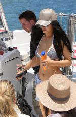 KYLIE JENNER in Bikini Top Arrives at a Boat