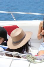 KYLIE JENNER in Bikini Top Arrives at a Boat