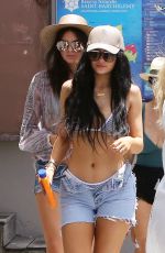 KYLIE JENNER in Bikini Top Arrives at a Boat
