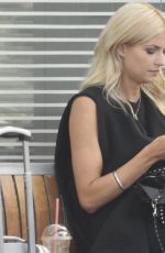LENA GERCKE Enjoys a Smoke at a Train Station in Berlin 08/21/2015