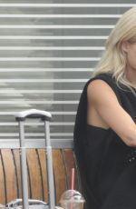 LENA GERCKE Enjoys a Smoke at a Train Station in Berlin 08/21/2015