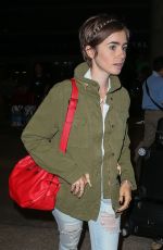 LILY COLLINS Arrives at LAX Airport in Los Angeles 08/12/2015
