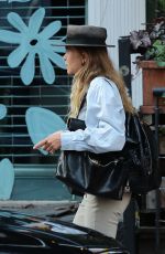 MARY KATE OLSEN Leaves Her Home in New York 07/31/2015