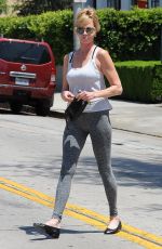 MELANIE GRIFFITH in Tights Out in Beverly Hills 07/31/2015