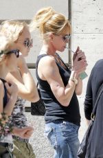 MELANIE GRIFFITH Out Shopping in New York 08/28/2015