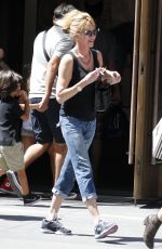 MELANIE GRIFFITH Out Shopping in New York 08/28/2015