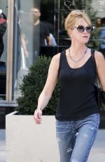 MELANIE GRIFFITH Out Shopping in New York 08/28/2015