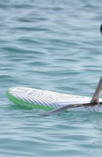 MICHELLE RODRIGUEZ in Bikini Paddleboarding in Sardinia 08/04/2015 (lq tag)